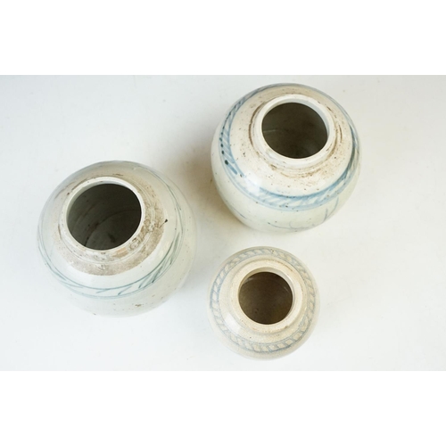 6 - Three Chinese antique white and blue ceramic ginger jar storage pots. Tallest - 13cm, smallest - 10c... 