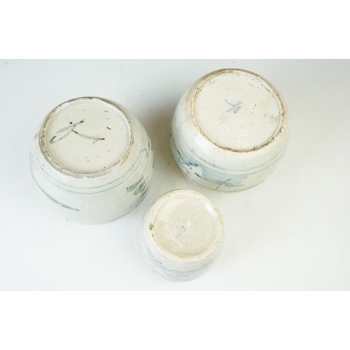 6 - Three Chinese antique white and blue ceramic ginger jar storage pots. Tallest - 13cm, smallest - 10c... 