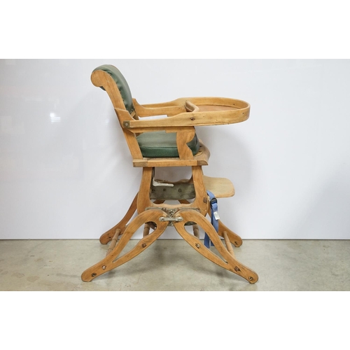 612 - Early 20th century child's high chair, with green leatherette studded seat and back, 85cm high