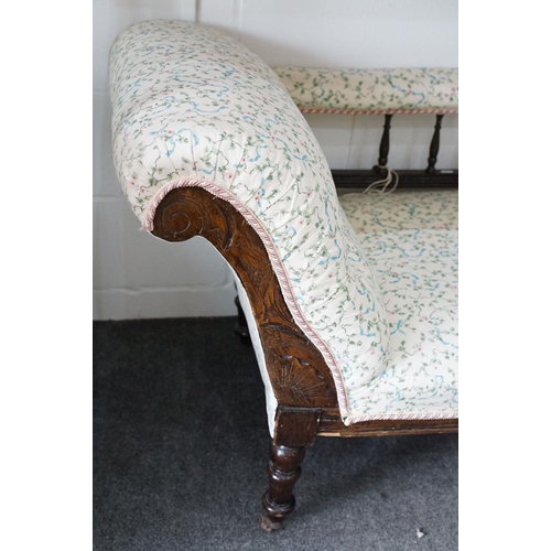 613 - 19th Century Victorian chaise longue having an oak frame with scrolled back rest, galleried back and... 