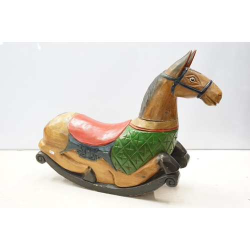 615 - Antique hand carved, hand painted low rocking horse. 56 tall x 74cm wide x 20cm deep