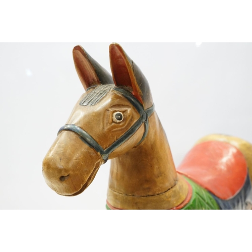 615 - Antique hand carved, hand painted low rocking horse. 56 tall x 74cm wide x 20cm deep