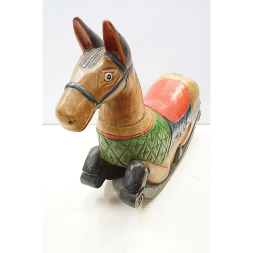 615 - Antique hand carved, hand painted low rocking horse. 56 tall x 74cm wide x 20cm deep