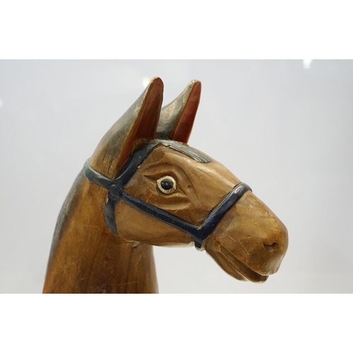 615 - Antique hand carved, hand painted low rocking horse. 56 tall x 74cm wide x 20cm deep