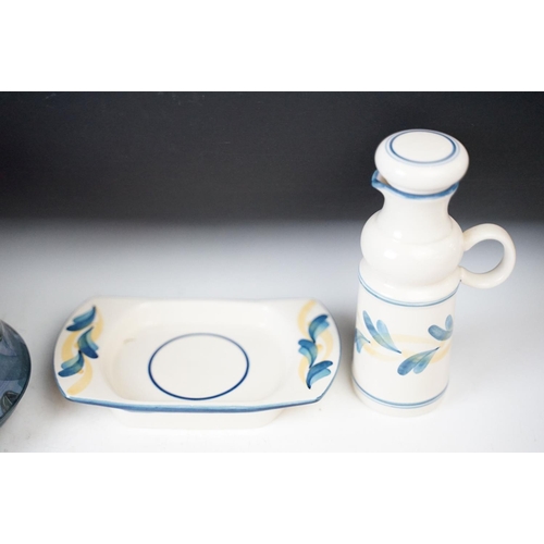 65 - Selection of Jersey pottery to include table lamp base, two mugs, salt and pepper shakers, egg cup h... 