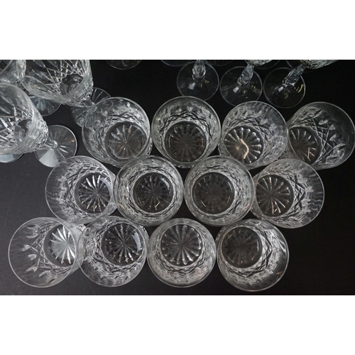 69 - Large selection of cut glass wine glasses, seven champagne flutes and twelve whiskey tumblers.