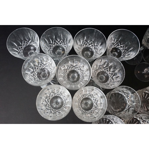 69 - Large selection of cut glass wine glasses, seven champagne flutes and twelve whiskey tumblers.