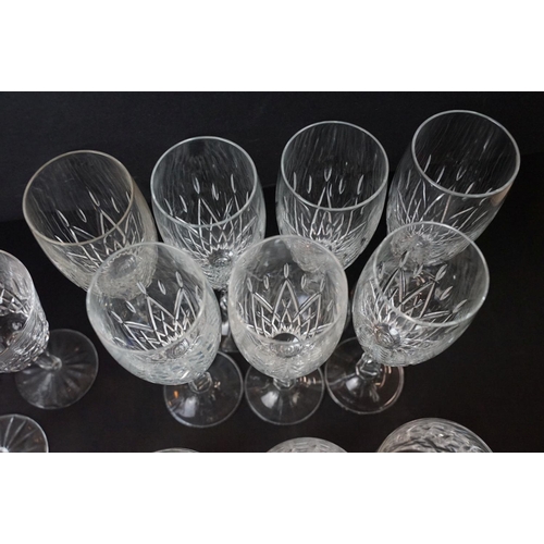 69 - Large selection of cut glass wine glasses, seven champagne flutes and twelve whiskey tumblers.