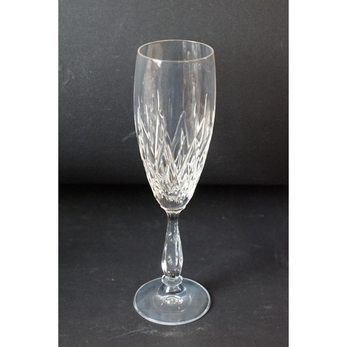 69 - Large selection of cut glass wine glasses, seven champagne flutes and twelve whiskey tumblers.