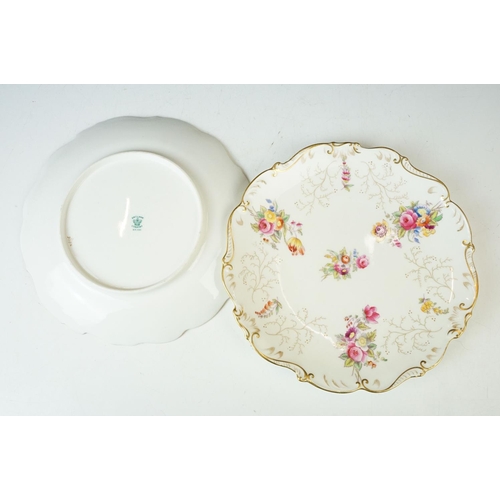 74 - Coalport floral spray and gilt decoration cake stands, handled cake plate and five plates.