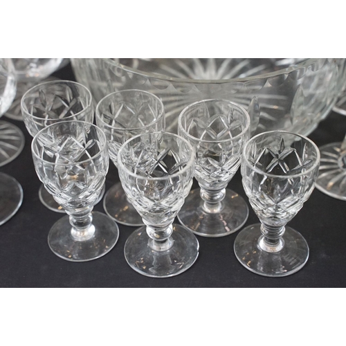 78 - Large selection of cut glass with decanters including two square cut, one round and a ship decanter ... 