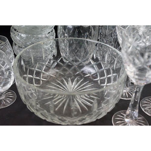 78 - Large selection of cut glass with decanters including two square cut, one round and a ship decanter ... 