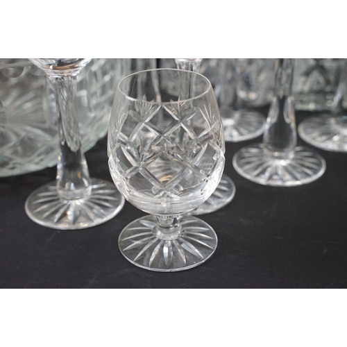 78 - Large selection of cut glass with decanters including two square cut, one round and a ship decanter ... 