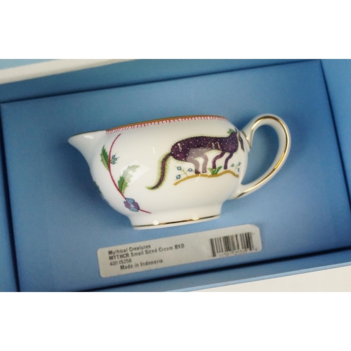 82 - Wedgwood boxed collection of 'Mythical Creatures' tea set items, two cups and saucers, cream jug, te... 