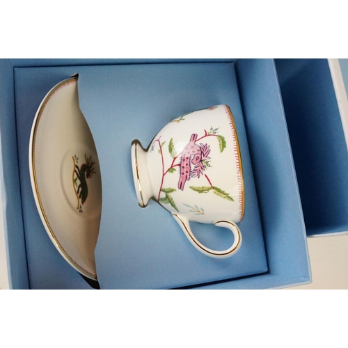 82 - Wedgwood boxed collection of 'Mythical Creatures' tea set items, two cups and saucers, cream jug, te... 