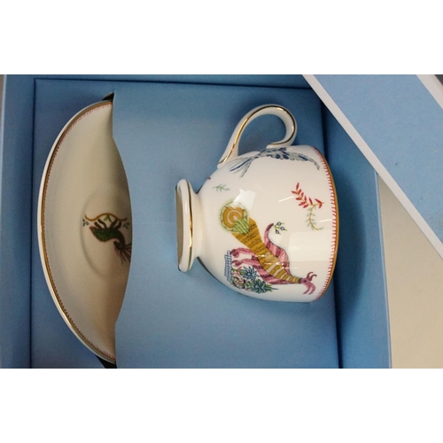 82 - Wedgwood boxed collection of 'Mythical Creatures' tea set items, two cups and saucers, cream jug, te... 