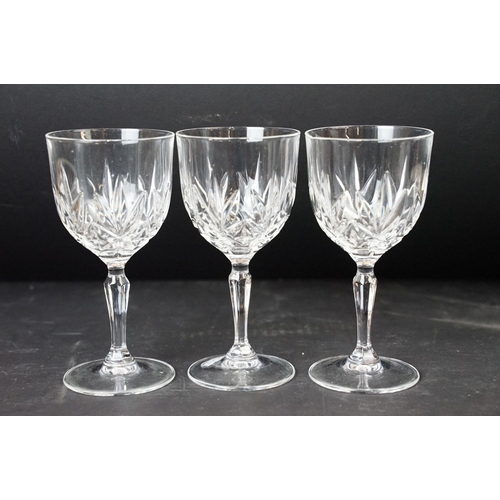 88 - Selection of cut glass wine and sherry glasses in various shapes and pattern designs.