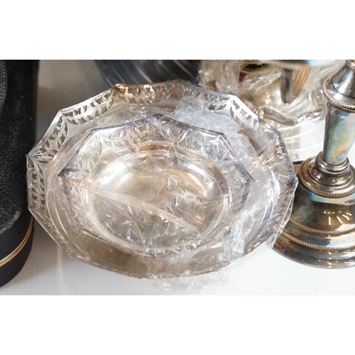 94 - Collection of assorted silver plate to include candlestick, cutlery canteen, dishes, lidded dish, co... 