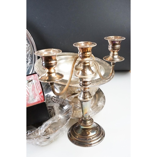 94 - Collection of assorted silver plate to include candlestick, cutlery canteen, dishes, lidded dish, co... 