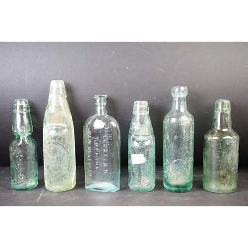 98 - Selection of Antique and Vintage glass and ceramic bottles of varying shapes and sizes, Torpedo bott... 