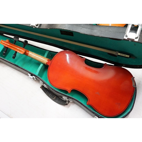 99 - Skylark brand miniature violin along with Pair of unbranded violins with bow, all in cases.