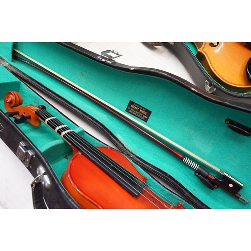 99 - Skylark brand miniature violin along with Pair of unbranded violins with bow, all in cases.