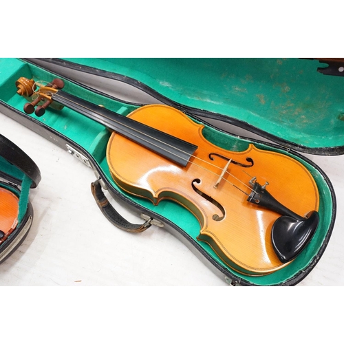 99 - Skylark brand miniature violin along with Pair of unbranded violins with bow, all in cases.