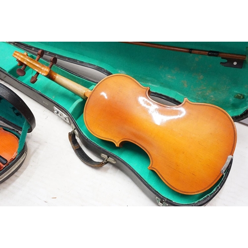 99 - Skylark brand miniature violin along with Pair of unbranded violins with bow, all in cases.