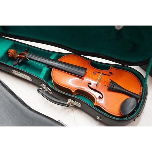 99 - Skylark brand miniature violin along with Pair of unbranded violins with bow, all in cases.