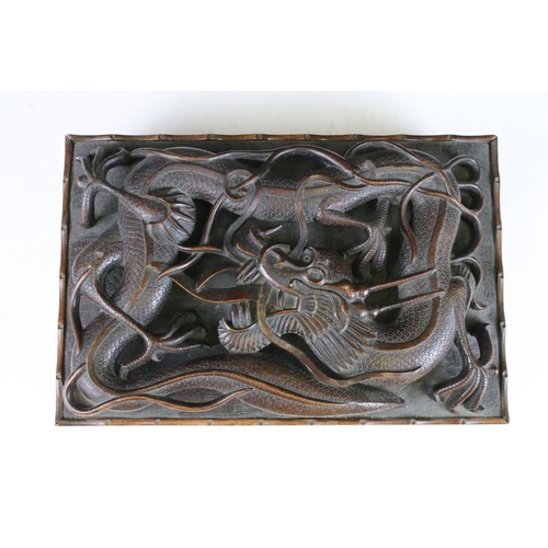 102 - Intricately carved dragon table top box with raised relief dragon to lift up top and carved dragon d... 