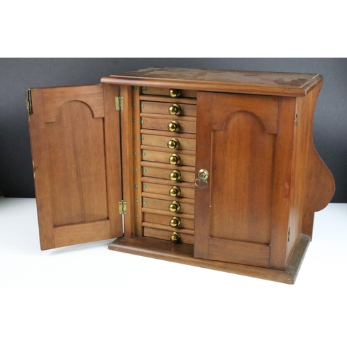 107 - Table top cabinet for coin collecting with ten drawers with assorted sized felt lined coin spacers, ... 