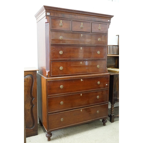 595 - 19th Century mahogany chest on chest having rounded medallion handles canted reeded corners to the t... 