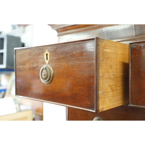 595 - 19th Century mahogany chest on chest having rounded medallion handles canted reeded corners to the t... 