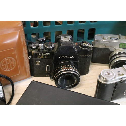 153 - Large selection of cameras, 35mm and medium format cameras to include Olympus XA2 with A11 flash (bo... 