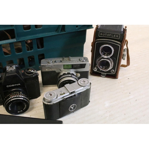 153 - Large selection of cameras, 35mm and medium format cameras to include Olympus XA2 with A11 flash (bo... 