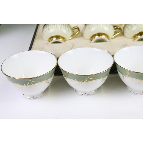 61 - Grafton China 'Malvern' tea set service with floral and gilt borders to include tea pot, coffee pot,... 