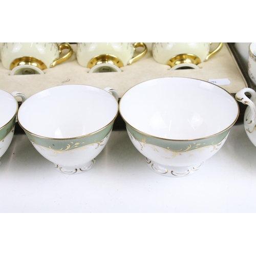 61 - Grafton China 'Malvern' tea set service with floral and gilt borders to include tea pot, coffee pot,... 