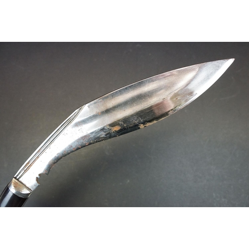 104 - A 3 Chirre / Fuller bladed Kukri knife, steel blade, horn handle with double brass banding, leather ... 