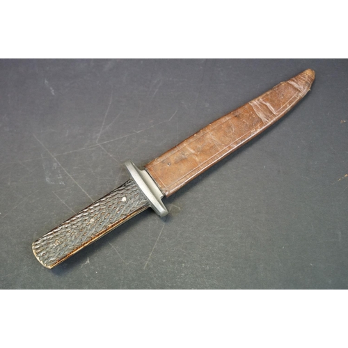 108 - A vintage hunting / fighting knife, blade marked Joseph Rogers & Sons, Cutlers To His Majesty, Sheff... 