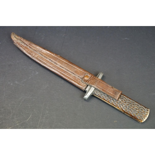 108 - A vintage hunting / fighting knife, blade marked Joseph Rogers & Sons, Cutlers To His Majesty, Sheff... 