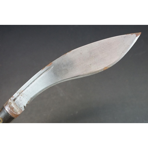 110 - A mid 20th century World War Two / WW2 era small kukri knife, fullered steel blade, two piece rivete... 