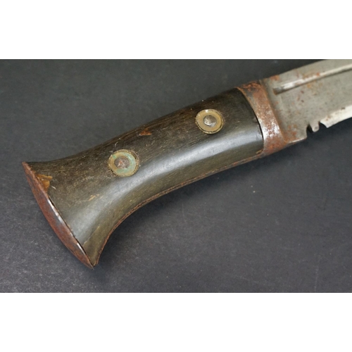 110 - A mid 20th century World War Two / WW2 era small kukri knife, fullered steel blade, two piece rivete... 