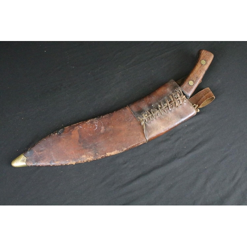 118 - A World War Two / WW2 Kukri, Steel Blade marked S.C.W. 43, two piece wooden riveted handle, scarce e... 