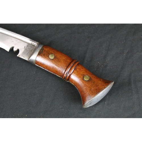 119 - A World War One / WW1 Gurkha Kukri knife, fullered steel blade, wooden two piece riveted handle with... 