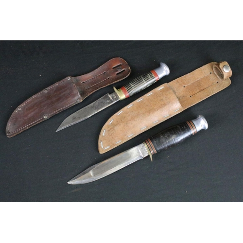 127 - Two Vintage William Rogers & Sons hunting / scouting sheath knives, both with clear markings to the ... 