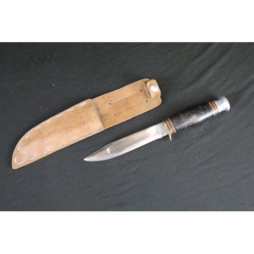 127 - Two Vintage William Rogers & Sons hunting / scouting sheath knives, both with clear markings to the ... 