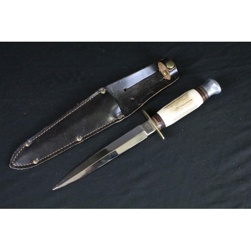 129 - Two vintage scouting / hunting knives, both having antler handles, brass hilts, aluminium pommels an... 