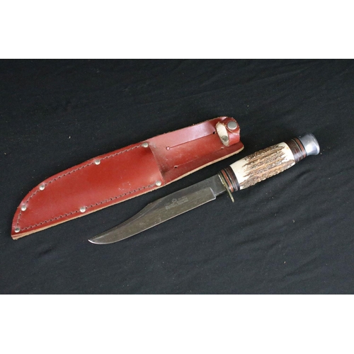 129 - Two vintage scouting / hunting knives, both having antler handles, brass hilts, aluminium pommels an... 