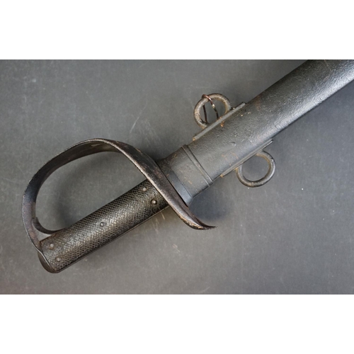 133 - A British model 1885 pattern Cavalry sword together with scabbard, WD and broad arrow mark to blade ... 