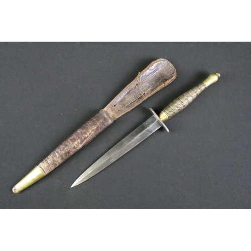 135 - A British World War Two Fairbairn sykes commando dagger, sterile with no markings complete with orig... 